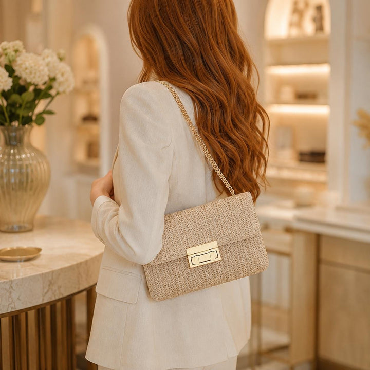 Woven Boho-style crossbody shoulder bag with chain.