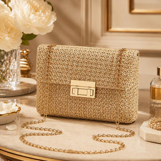 Woven Boho-style crossbody shoulder bag with chain.