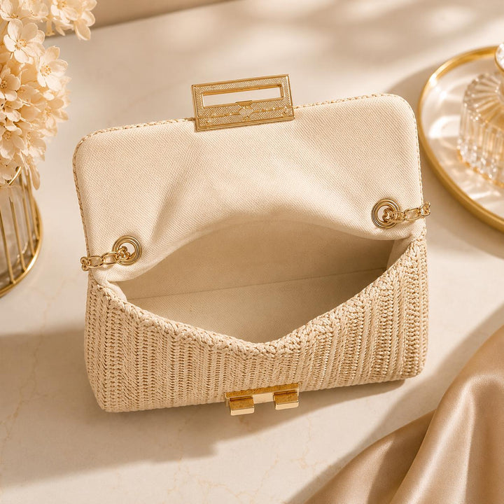 Woven Boho-style crossbody shoulder bag with chain.