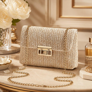 Woven Boho-style crossbody shoulder bag with chain.